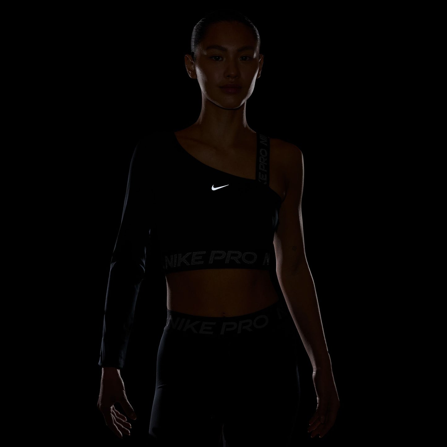 PRO SHINE DRI-FIT ASYMMETRICAL CROPPED TOP - BLACK/REFLECTIVE SILVER